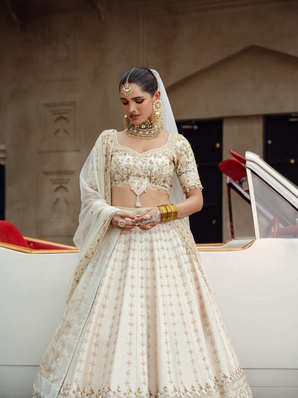 Beige Silk Embroidered Lehenga Ensemble with Dual Organza Dupatta