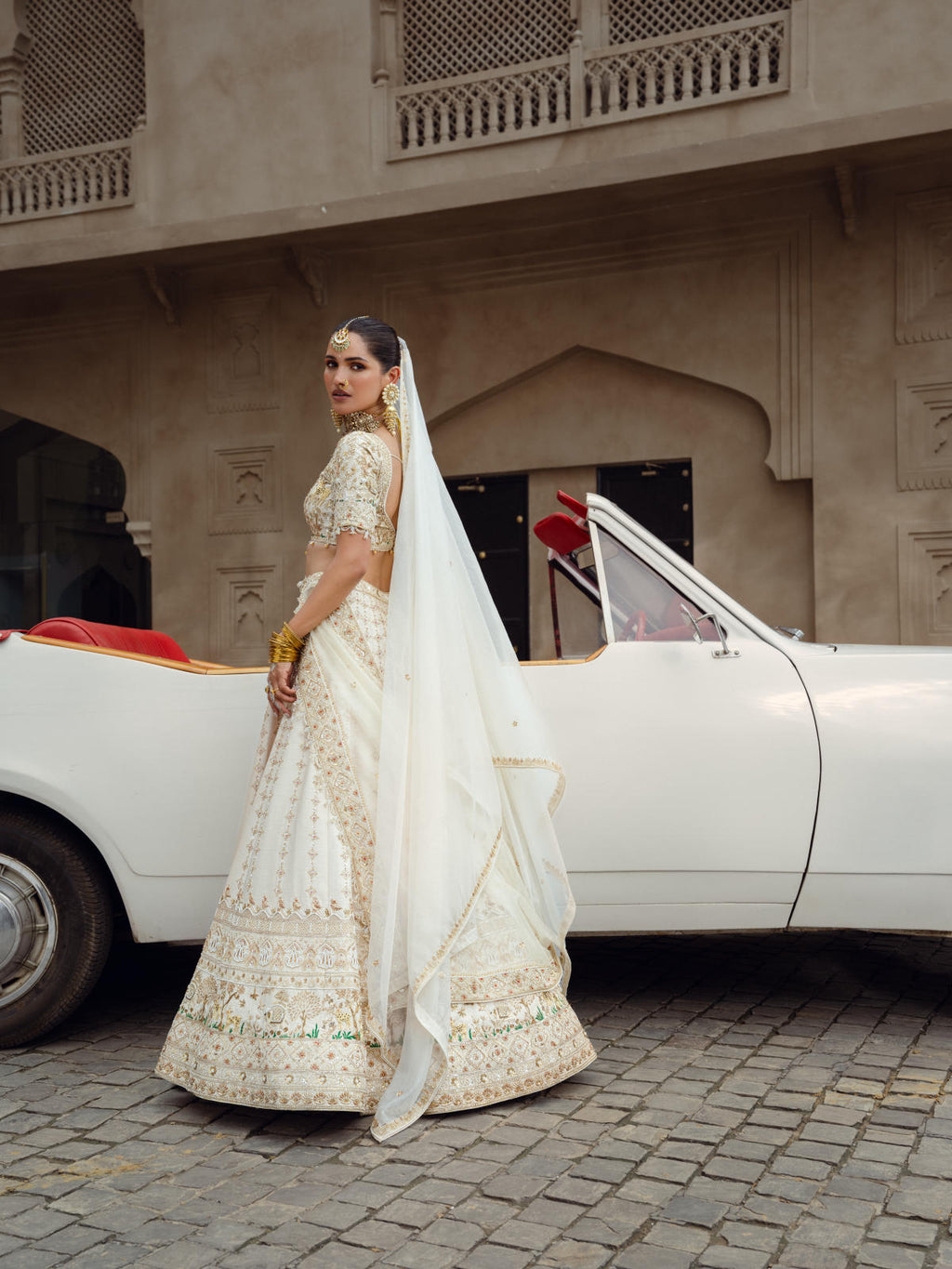 Beige Silk Embroidered Lehenga Ensemble with Dual Organza Dupatta