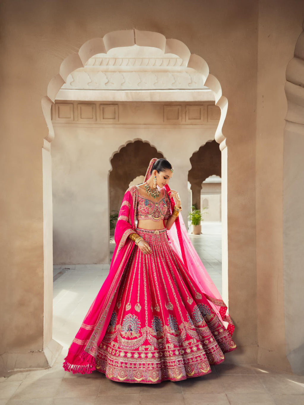 Rani Pink Textured Silk Lehenga Set with Organza Dupatta
