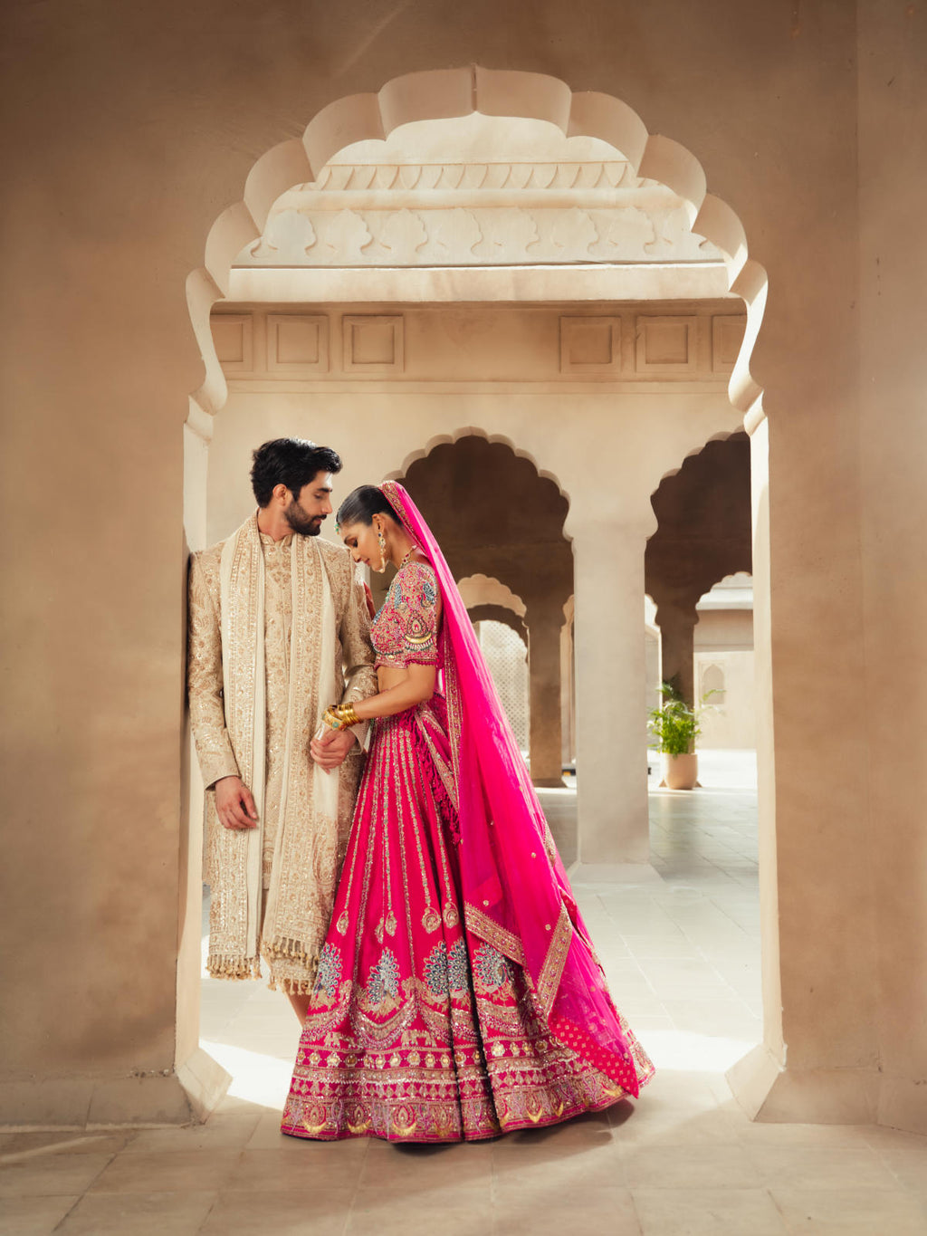 Rani Pink Textured Silk Lehenga Set with Organza Dupatta